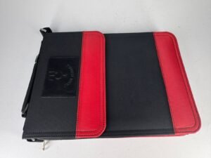 WhatsApp Image 2026-01-17 at 16.34.30 Red and black tetron material tech-bag